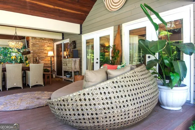 a view of outdoor space with deck and furniture