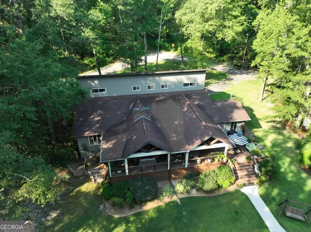 a backyard of a house with lots of green space