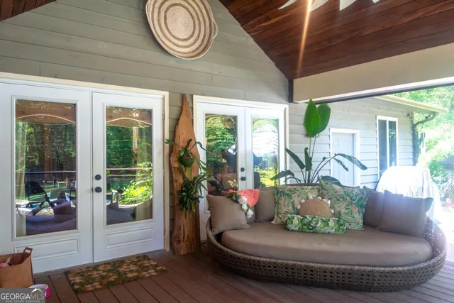 a backyard of a house with lots of green space and tree