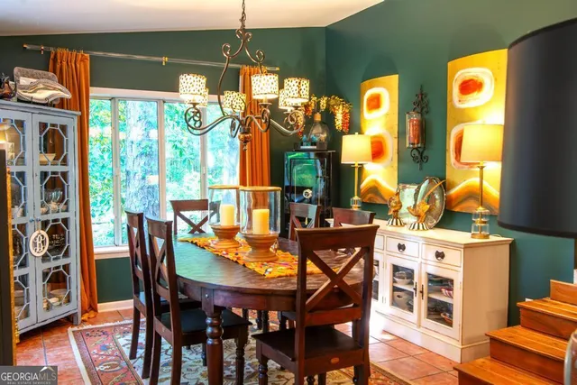 a view of a tree in the middle of a yard