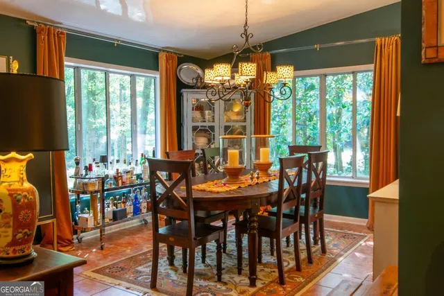 a living room with furniture fireplace and flat screen tv