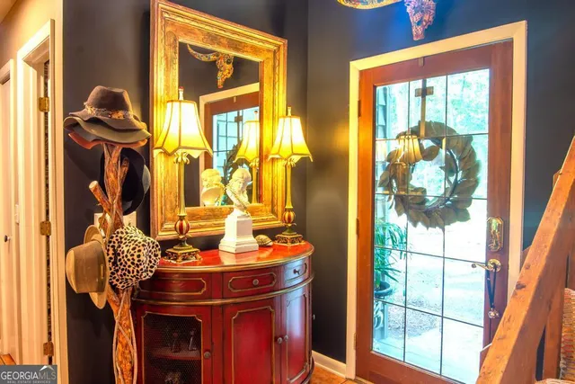 a kitchen with stainless steel appliances a stove a sink and cabinets