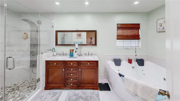 a view of a hallway with closet and a livingroom view