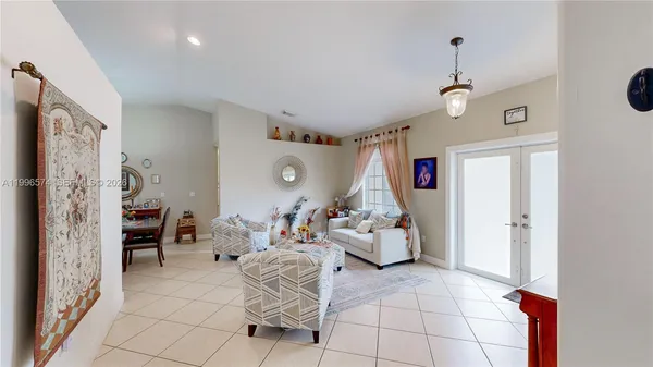 a view of an empty room and a windows