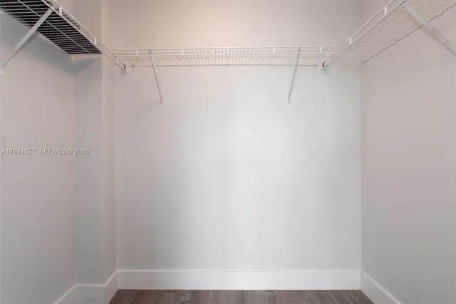 a view of a room with racks on the wall