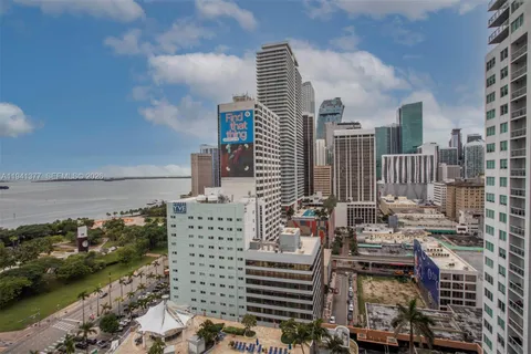 a view of city with ocean