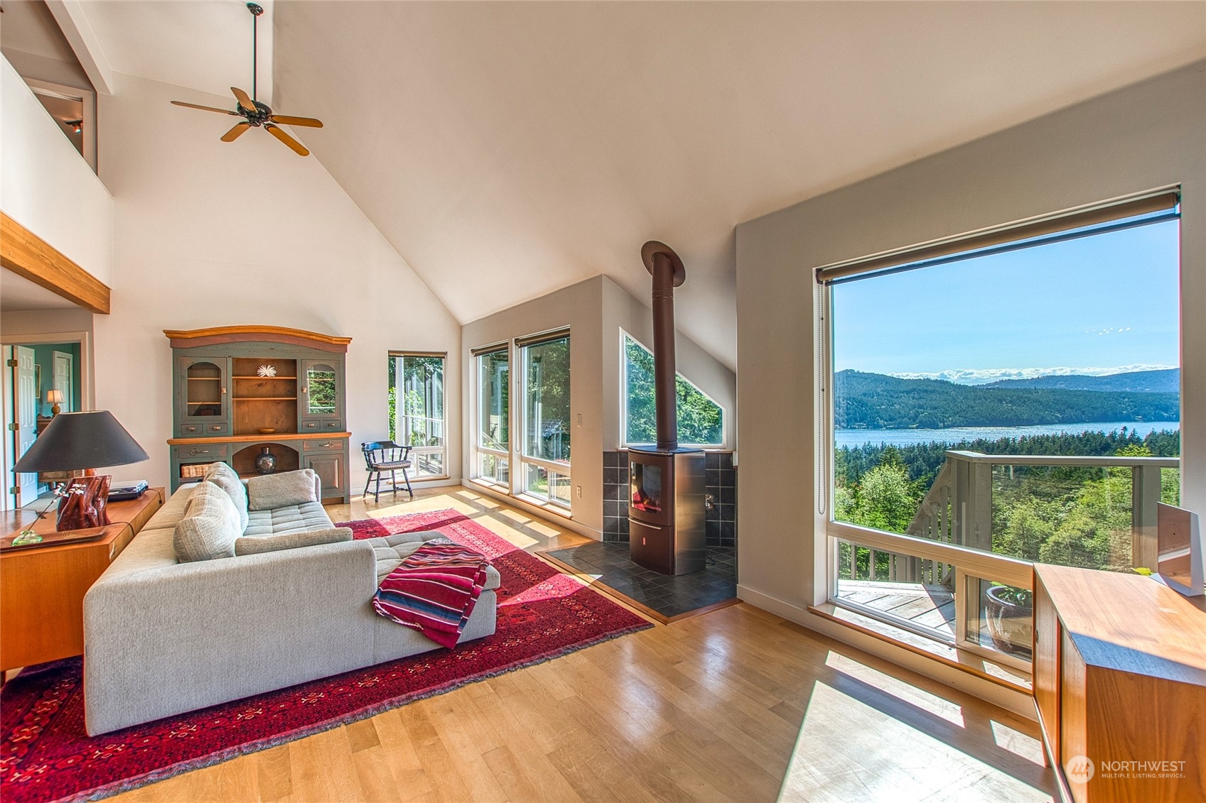 381 Geiser Way Orcas Island, WA 98245 - Photo 1 of 40 a living room with furniture and a large window