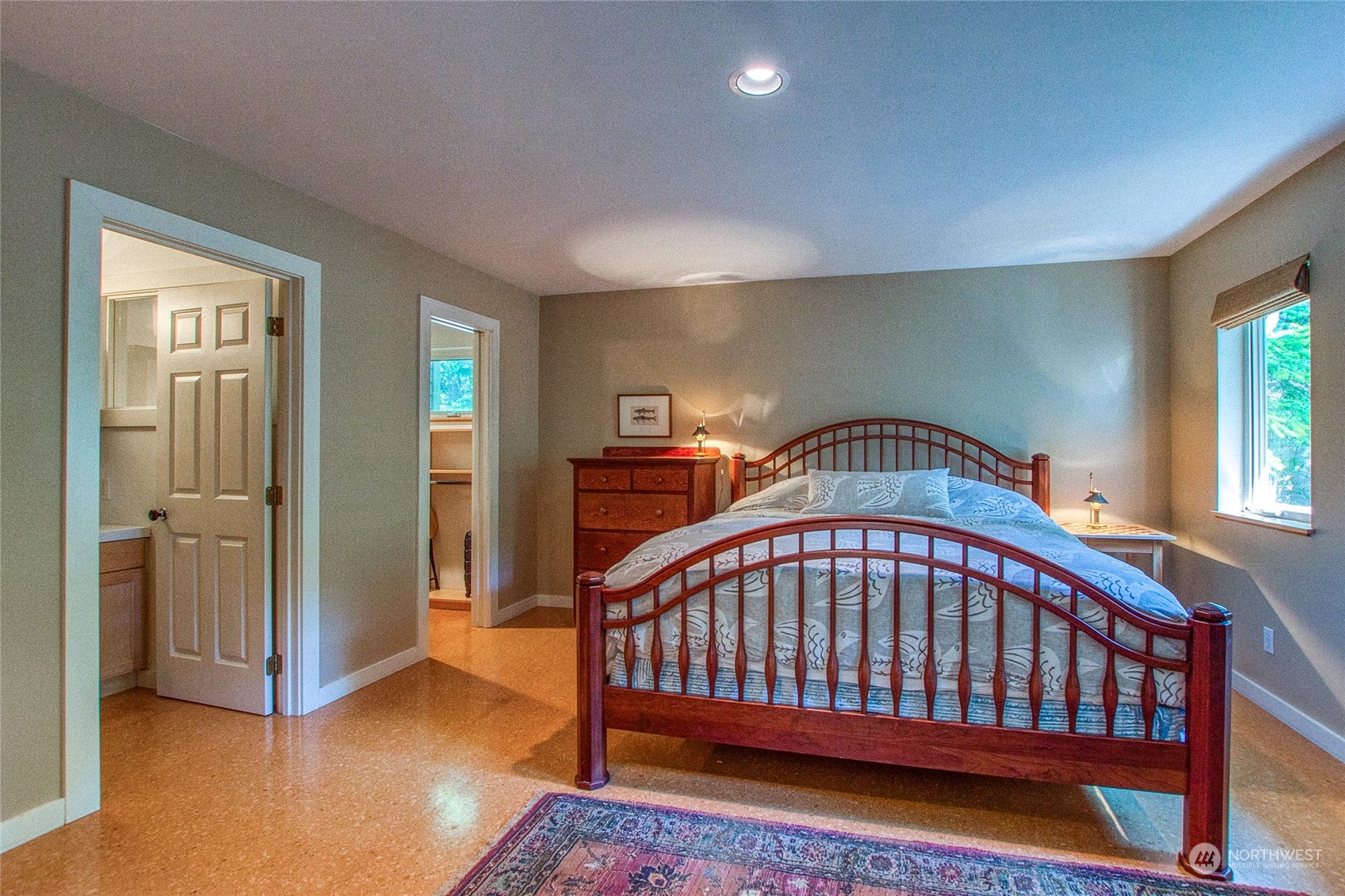 381 Geiser Way Orcas Island, WA 98245 - Photo 20 of 40 a bedroom with a bed and a window