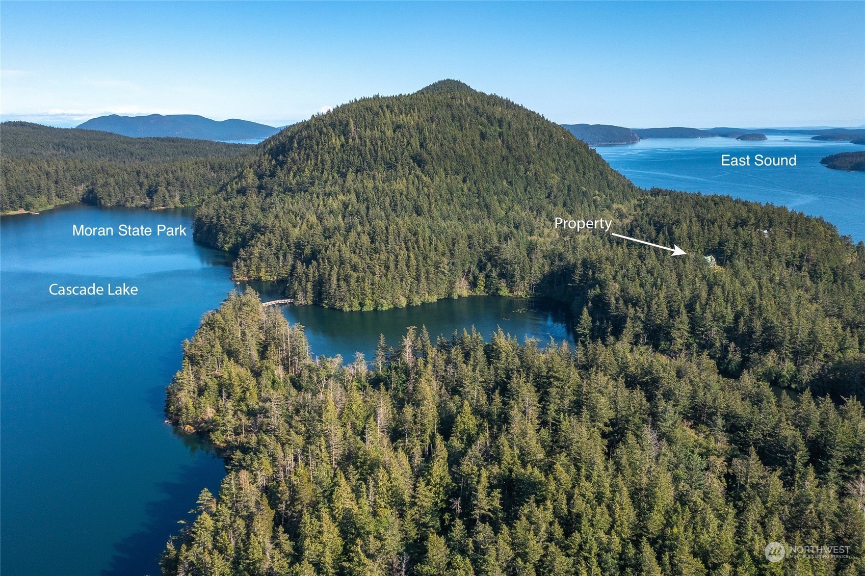 381 Geiser Way Orcas Island, WA 98245 - Photo 2 of 40 a view of a lake with a mountain in the background