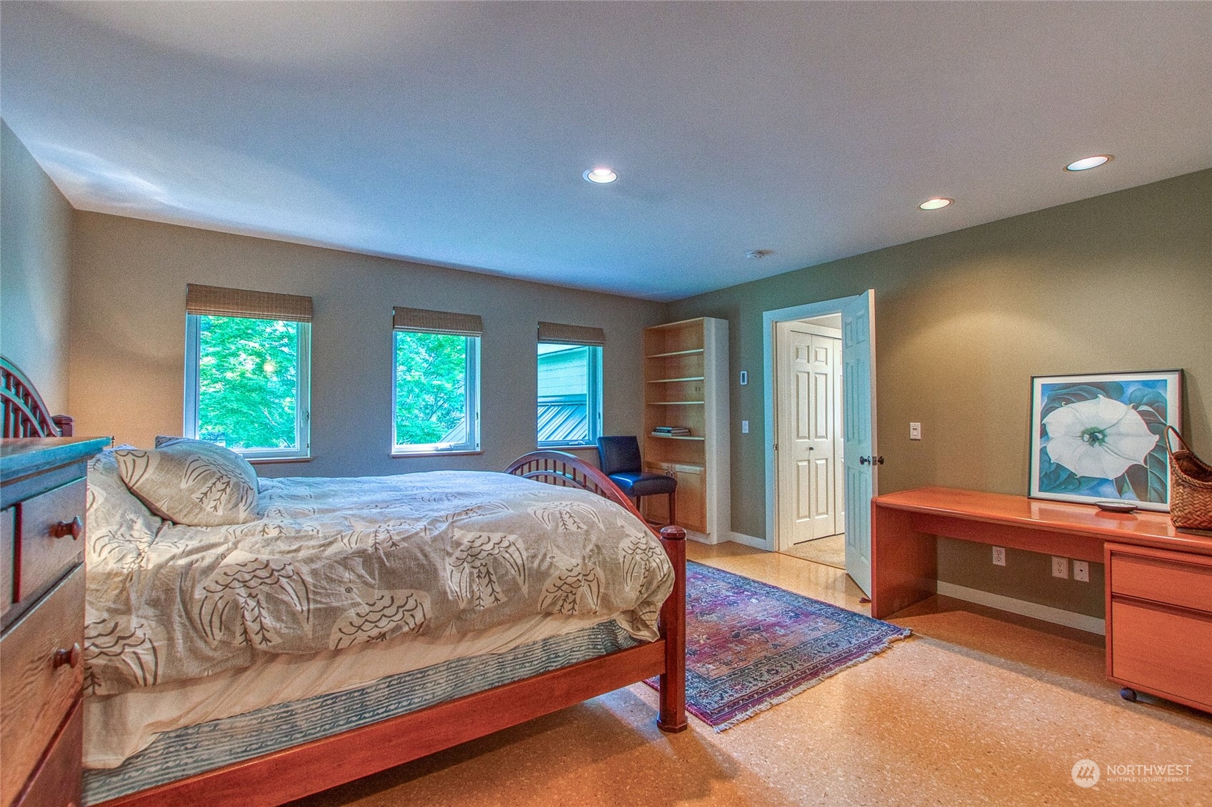 381 Geiser Way Orcas Island, WA 98245 - Photo 21 of 40 a bedroom with a bed and a dresser next to a window
