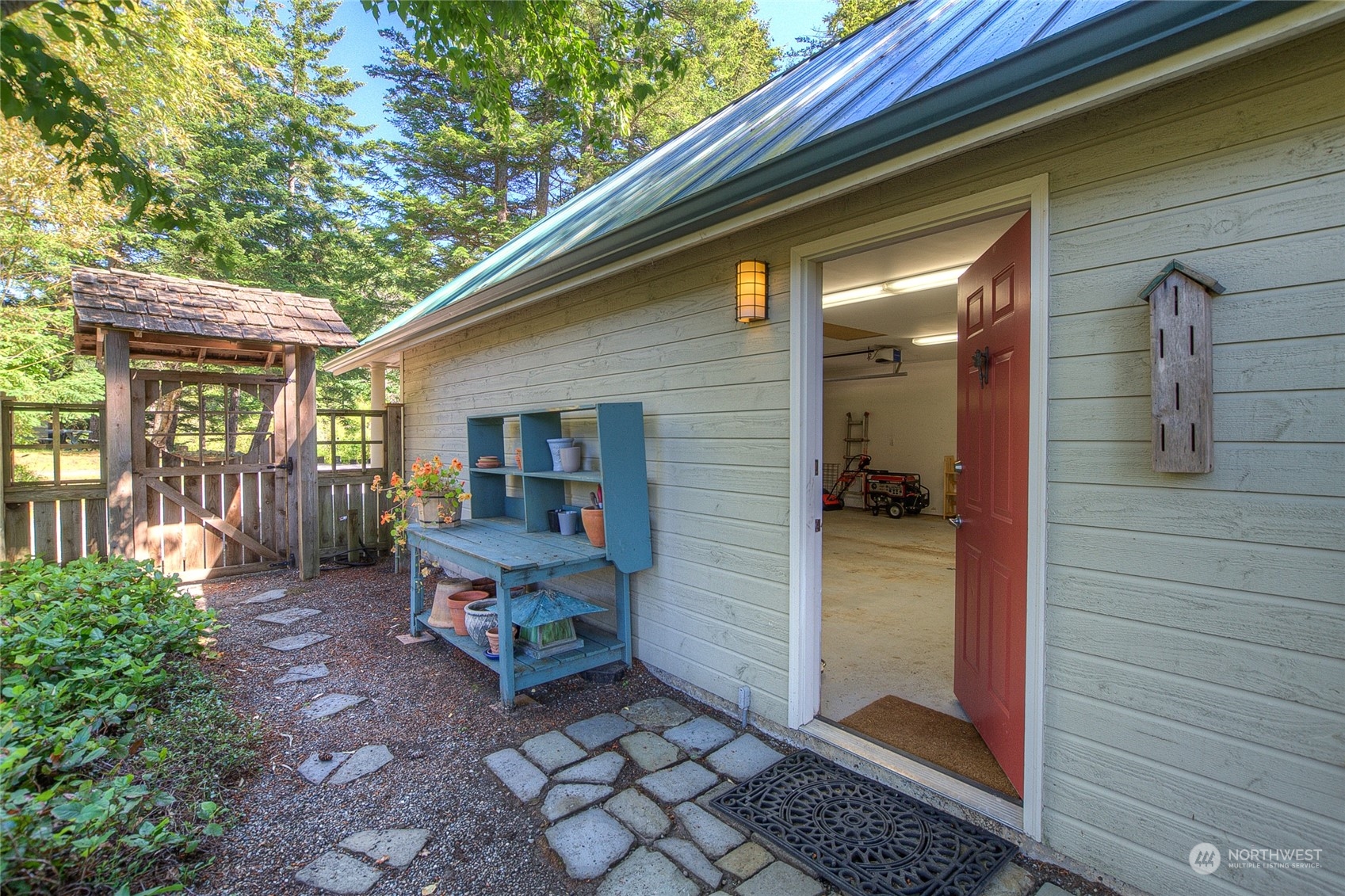 381 Geiser Way Orcas Island, WA 98245 - Photo 35 of 40 a backyard of a house with seating space