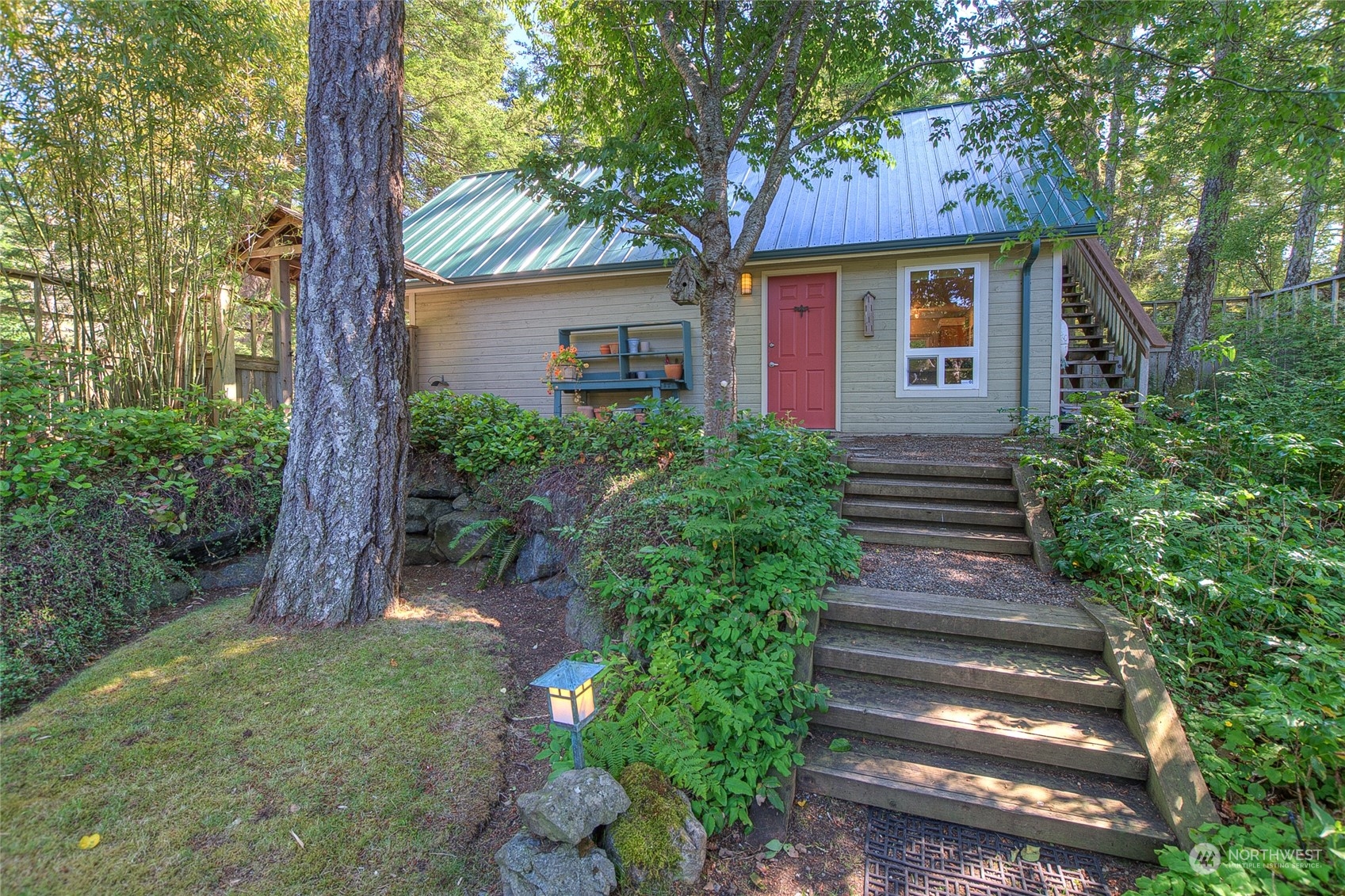 381 Geiser Way Orcas Island, WA 98245 - Photo 36 of 40 a view of a house with a yard and pathway
