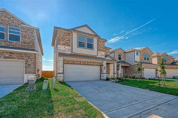 a front view of house with yard