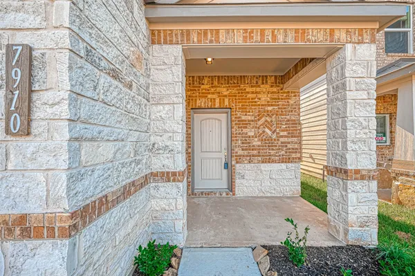 a view of a brick wall of the building