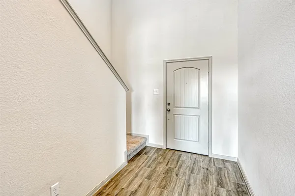 a view of front door with hallway