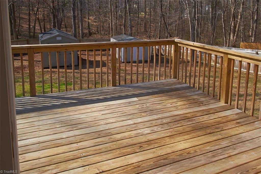 1012 Springwood Lane Archdale, NC 27370 - Photo 17 of 46 16 x 10 deck that is accessed from the dining room and kitchen. Deck new in 2019 per previous owner.