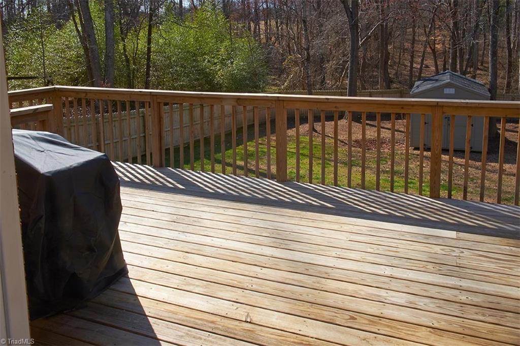 1012 Springwood Lane Archdale, NC 27370 - Photo 18 of 46 View of the backyard from the deck. A wonderful place to enjoy your morning coffee!