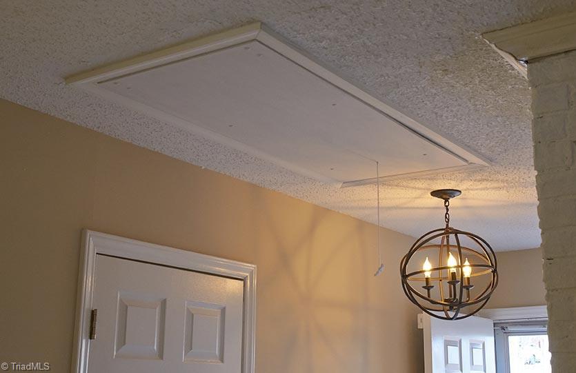 1012 Springwood Lane Archdale, NC 27370 - Photo 19 of 46 New aluminum pull down stairs to partially floored attic. Updated lighting.