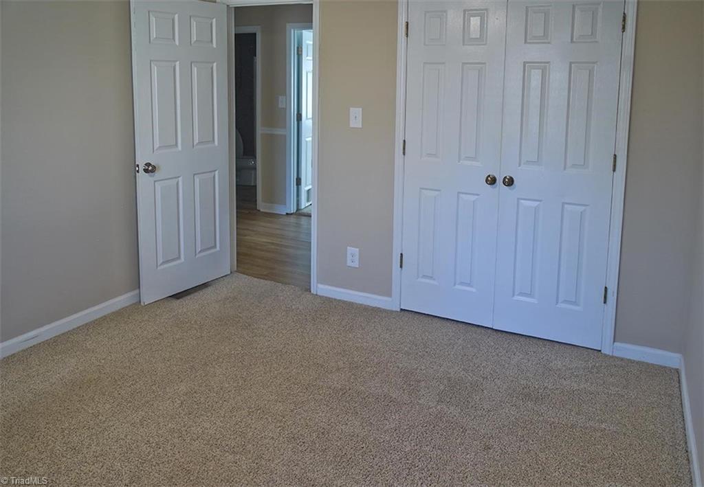 1012 Springwood Lane Archdale, NC 27370 - Photo 30 of 46 Bedroom 2 double closet.