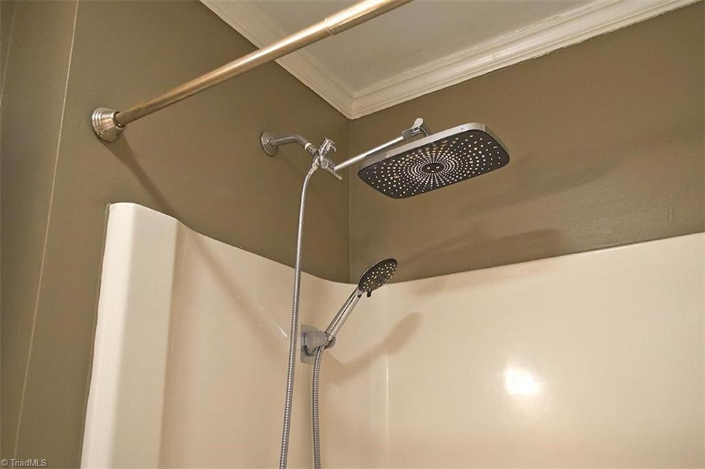 1012 Springwood Lane Archdale, NC 27370 - Photo 37 of 46 Both bathrooms have shower rain heads.