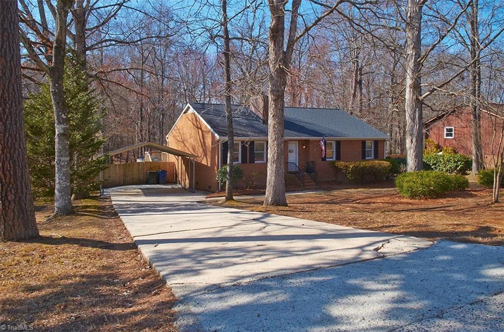 1012 Springwood Lane Archdale, NC 27370 - Photo 43 of 46 Spacious partially wooded lot! Concrete Driveway. Double detached carport remains.