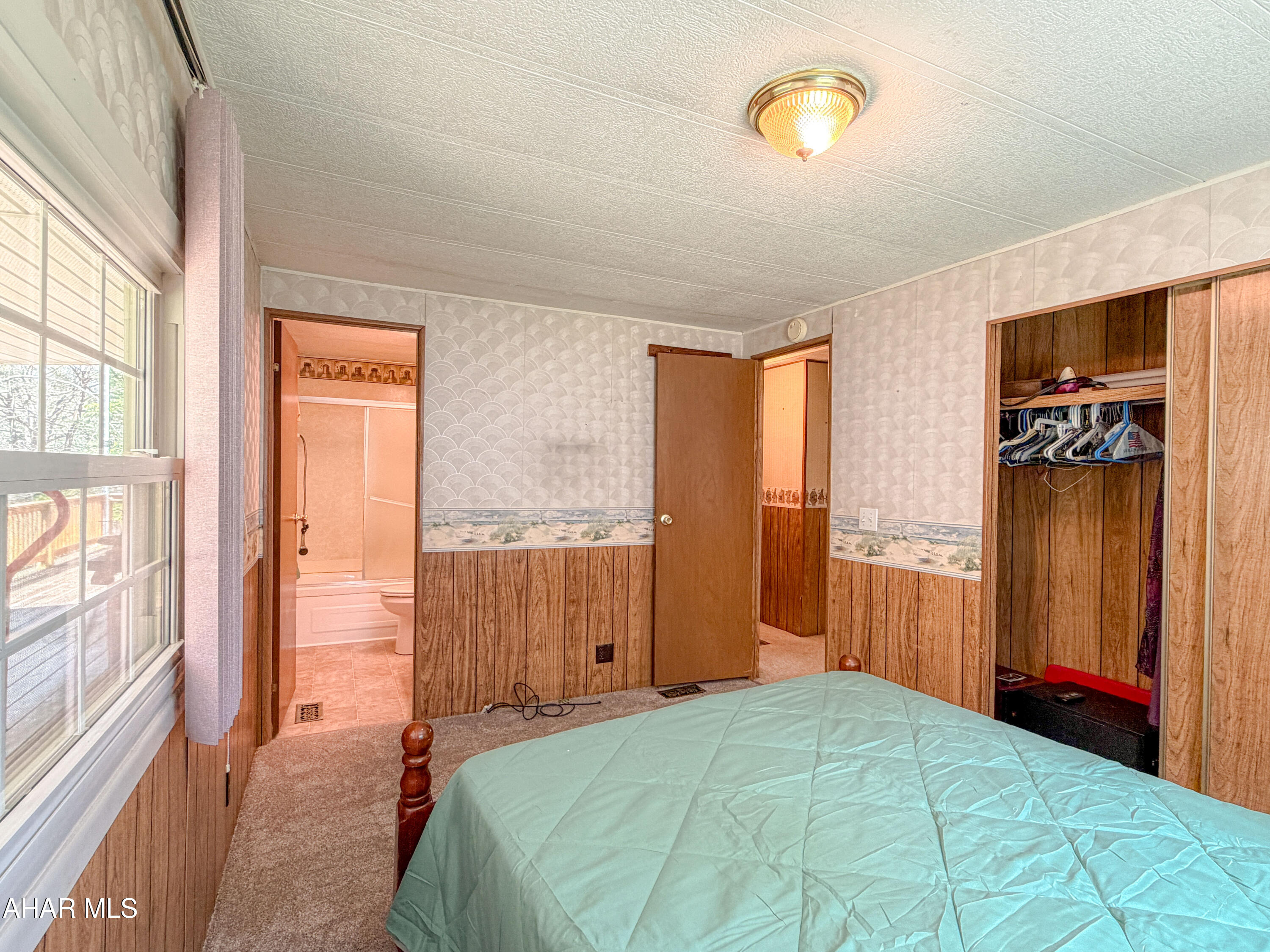 151 Pine Echo Road Everett, PA 15537 - Photo 33 of 51 a bedroom with a bed and a window
