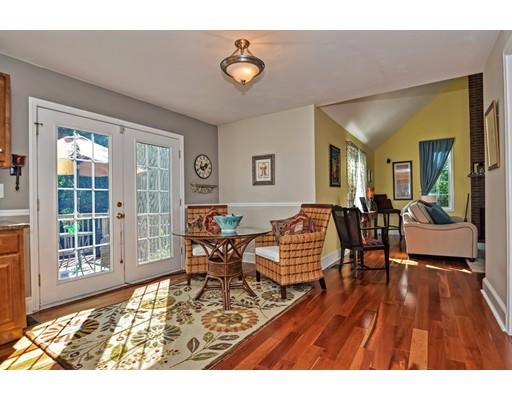 3 Francis Farm Road Rehoboth, MA 02769 - Photo 13 of 30 a living room with furniture dining table and a flat screen tv