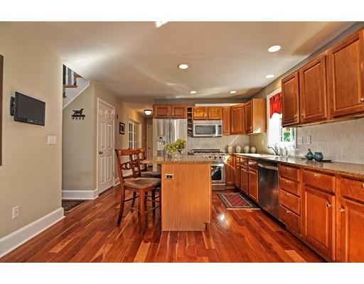 3 Francis Farm Road Rehoboth, MA 02769 - Photo 14 of 30 a kitchen with a table chairs refrigerator and microwave