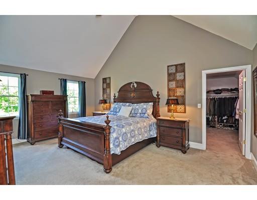 3 Francis Farm Road Rehoboth, MA 02769 - Photo 27 of 30 a bedroom with a bed and a chandelier