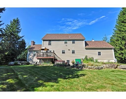 3 Francis Farm Road Rehoboth, MA 02769 - Photo 5 of 30 a backyard of a house with table and chairs