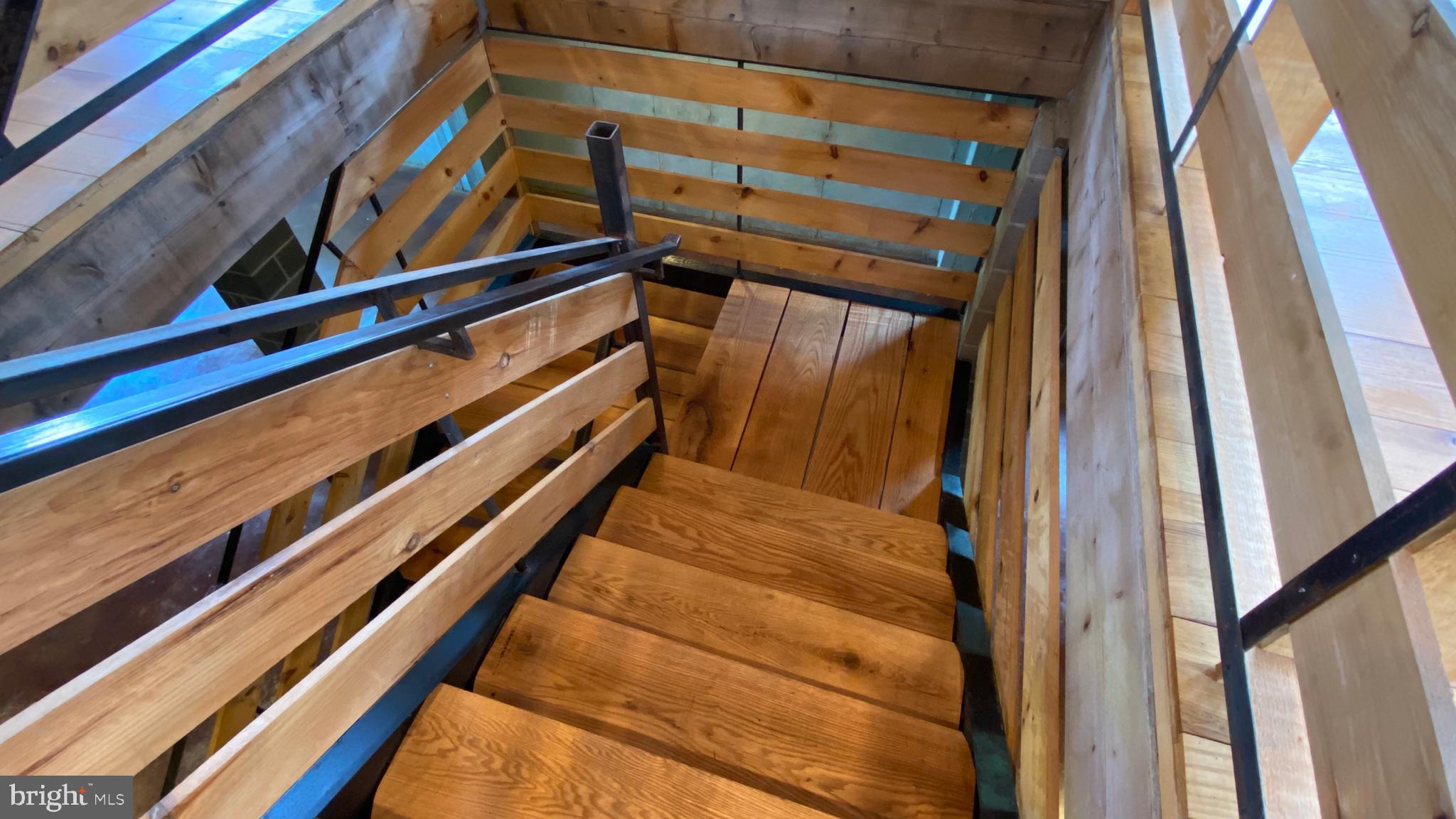176 Smithtown Road Pipersville, PA 18947 - Photo 43 of 56 The central staircase