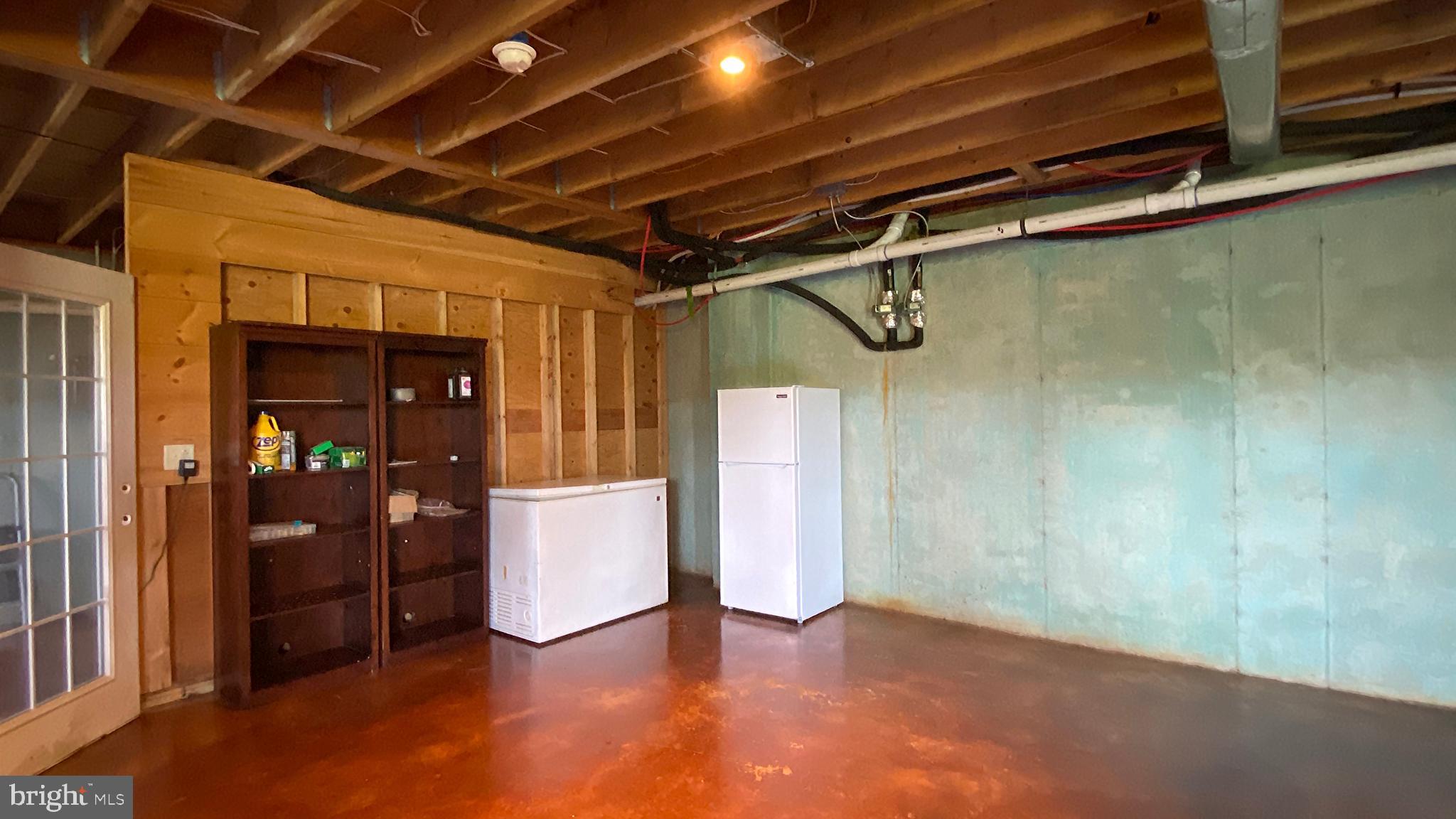 176 Smithtown Road Pipersville, PA 18947 - Photo 47 of 56 Extra storage with backup freezer and fridge.