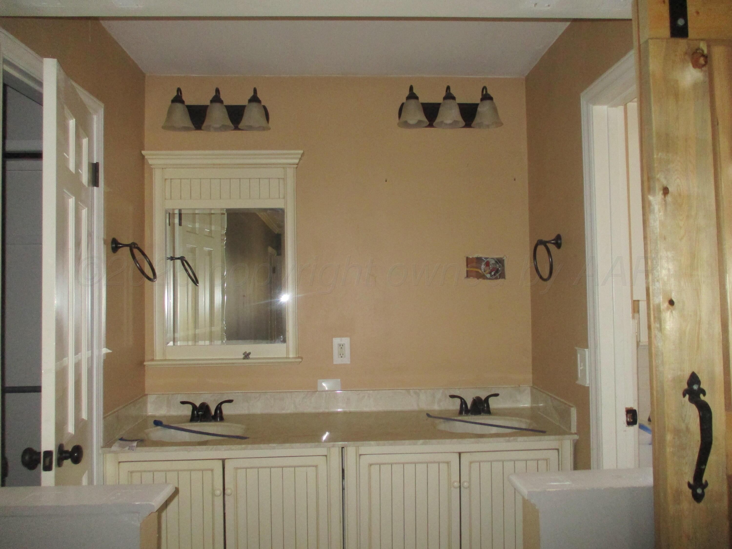 6702 Calumet Road Amarillo, TX 79106 - Photo 20 of 30 Vanity in Private Bath Bedroom 4