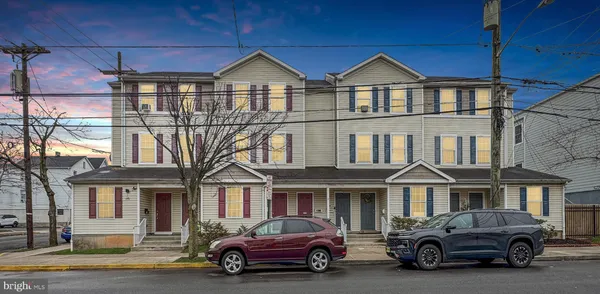 a car parked in front of a house