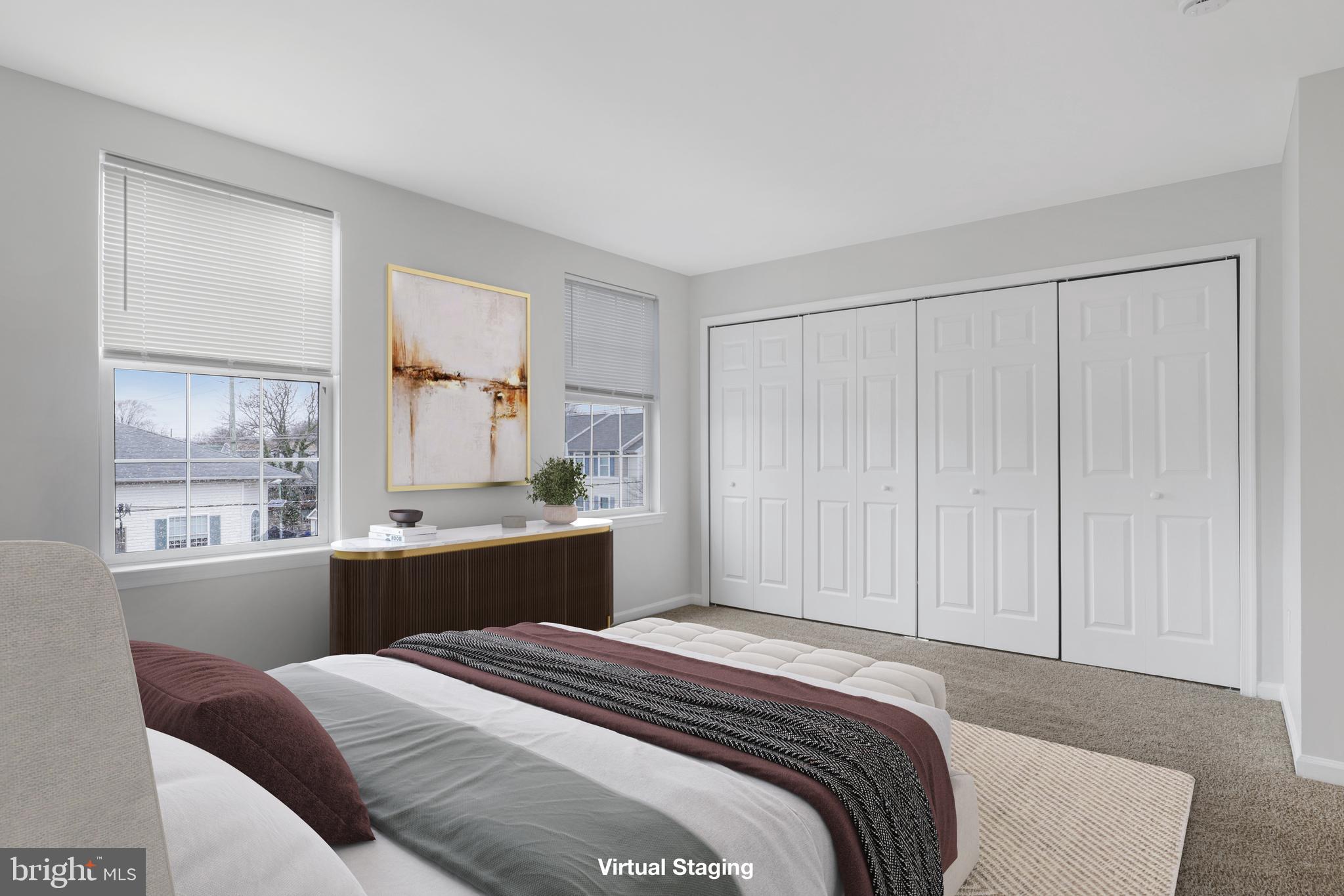 130B Remsen Avenue New Brunswick, NJ 08901 - Photo 15 of 33 a bedroom with a bed and a window