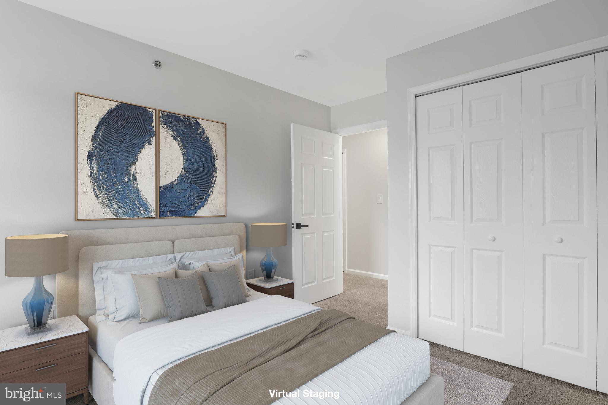 130B Remsen Avenue New Brunswick, NJ 08901 - Photo 19 of 33 a bedroom with a bed and a painting on the wall