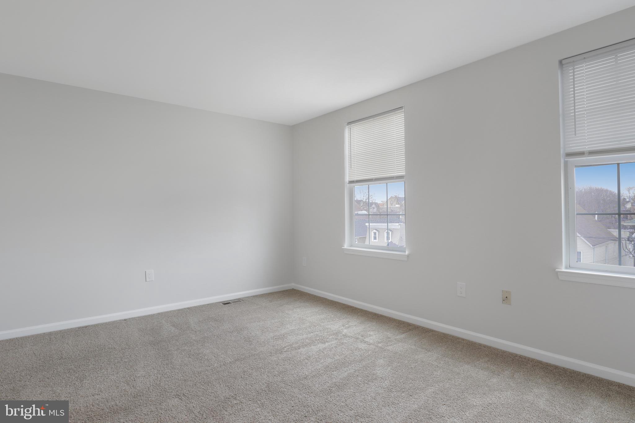 130B Remsen Avenue New Brunswick, NJ 08901 - Photo 24 of 33 an empty room with windows