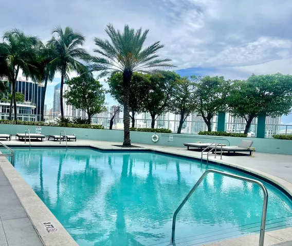 a view of a glass door and a window