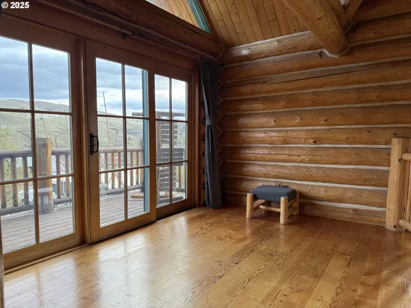 a view of room with window and chair