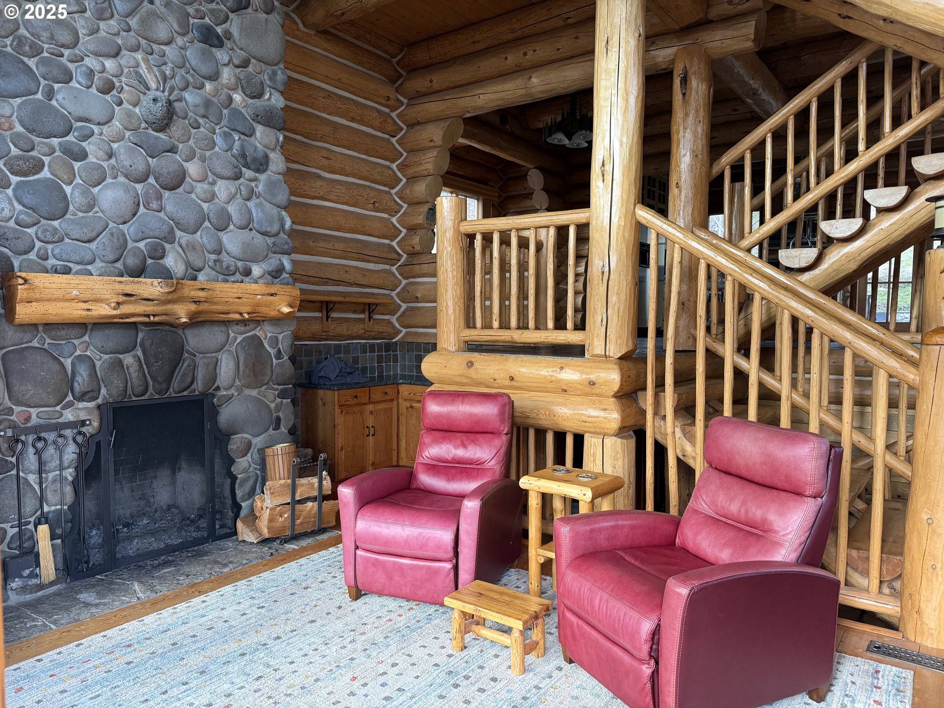 507 Elrod Avenue Maupin, OR 97037 - Photo 4 of 33 a outdoor living area with furniture and a fireplace