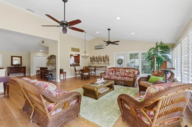 a bathroom with a granite countertop sink toilet and a mirror