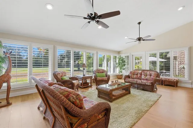 a spacious bathroom with a granite countertop sink mirror and a