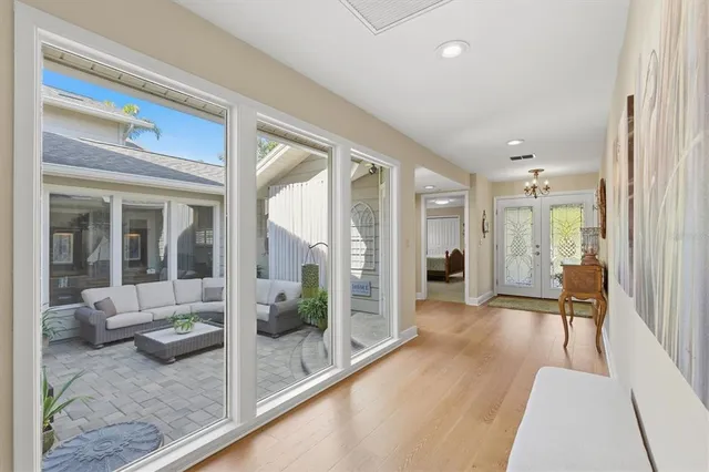 a view of a patio with chairs and a table