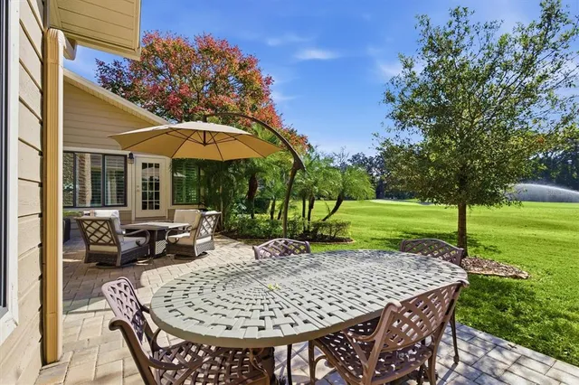 a view of a field with an ocean