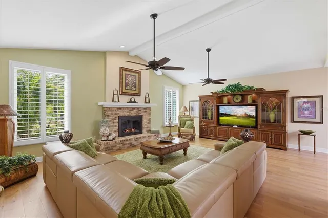 a kitchen with stainless steel appliances granite countertop wooden cabinets a stove top oven a sink and dishwasher