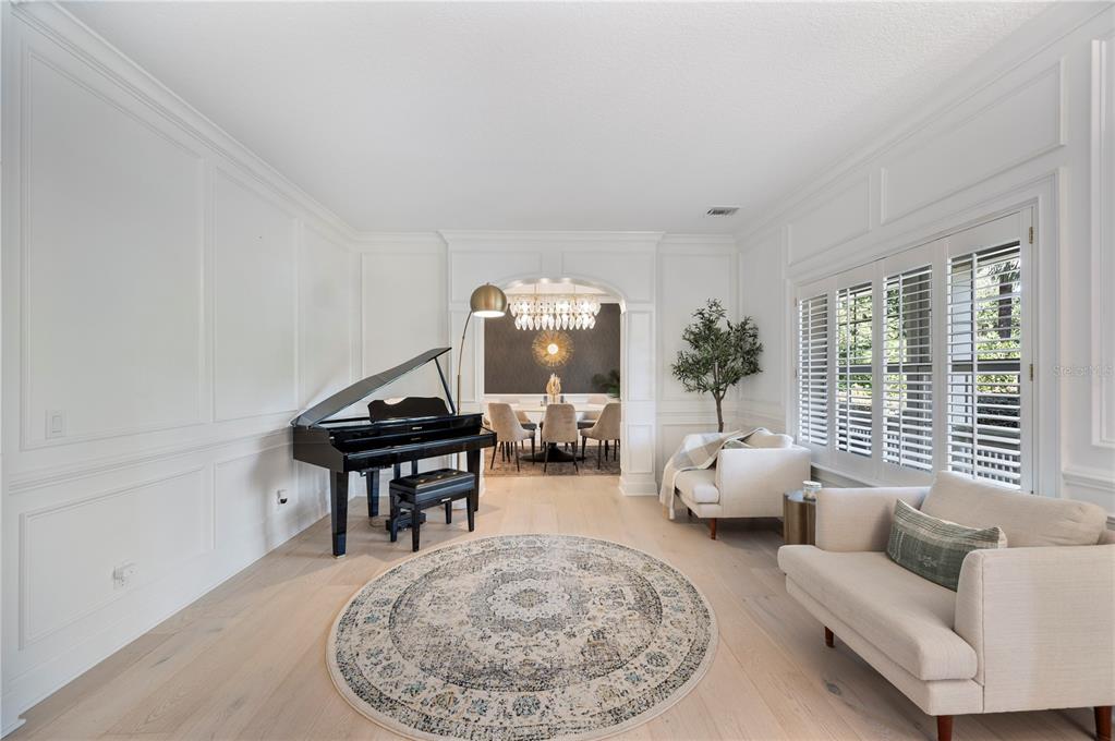 1909 New Jersey Road Lakeland, FL 33803 - Photo 11 of 93 a living room with furniture and a large window