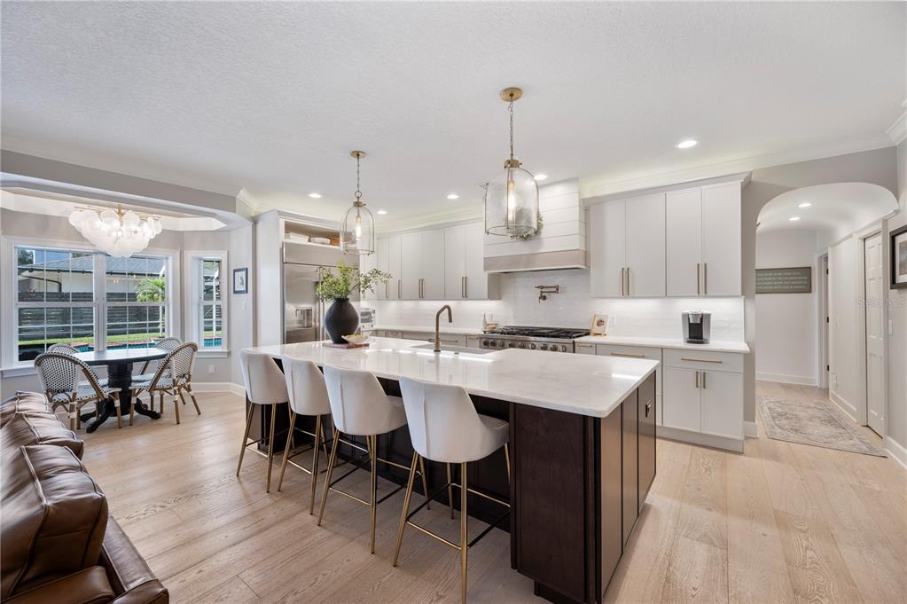 1909 New Jersey Road Lakeland, FL 33803 - Photo 29 of 93 a large kitchen with a table and chairs