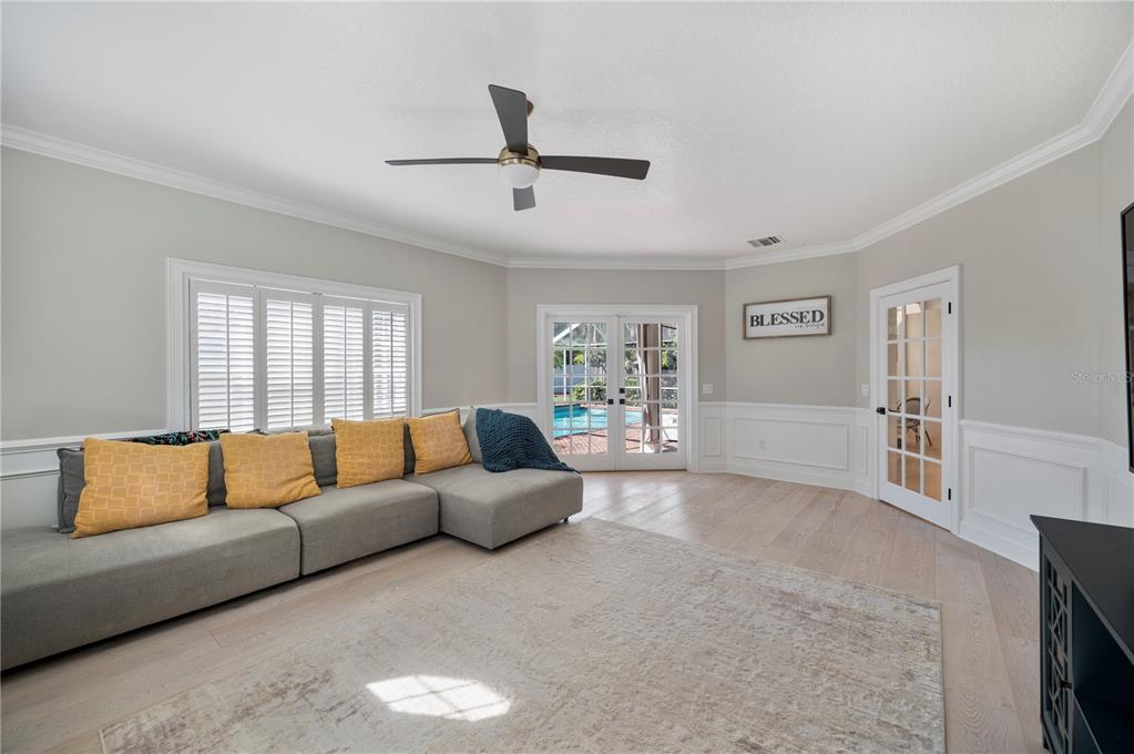 1909 New Jersey Road Lakeland, FL 33803 - Photo 34 of 93 a living room with furniture and a flat screen tv