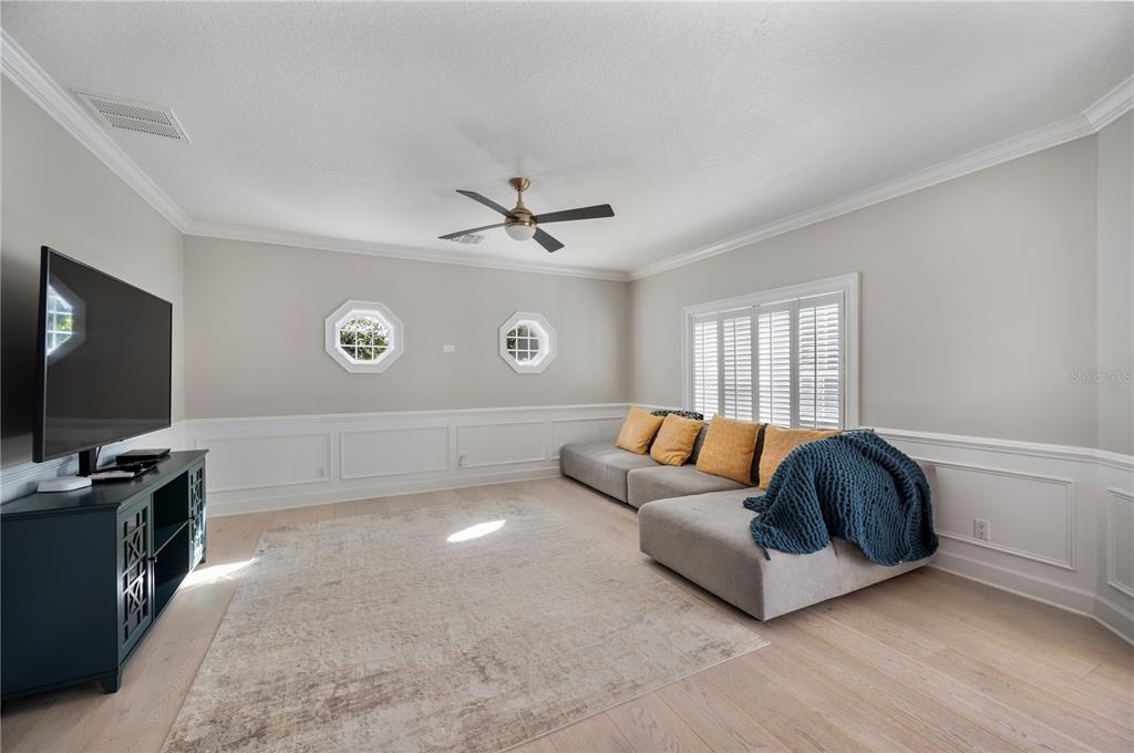 1909 New Jersey Road Lakeland, FL 33803 - Photo 37 of 93 a living room with furniture and a flat screen tv