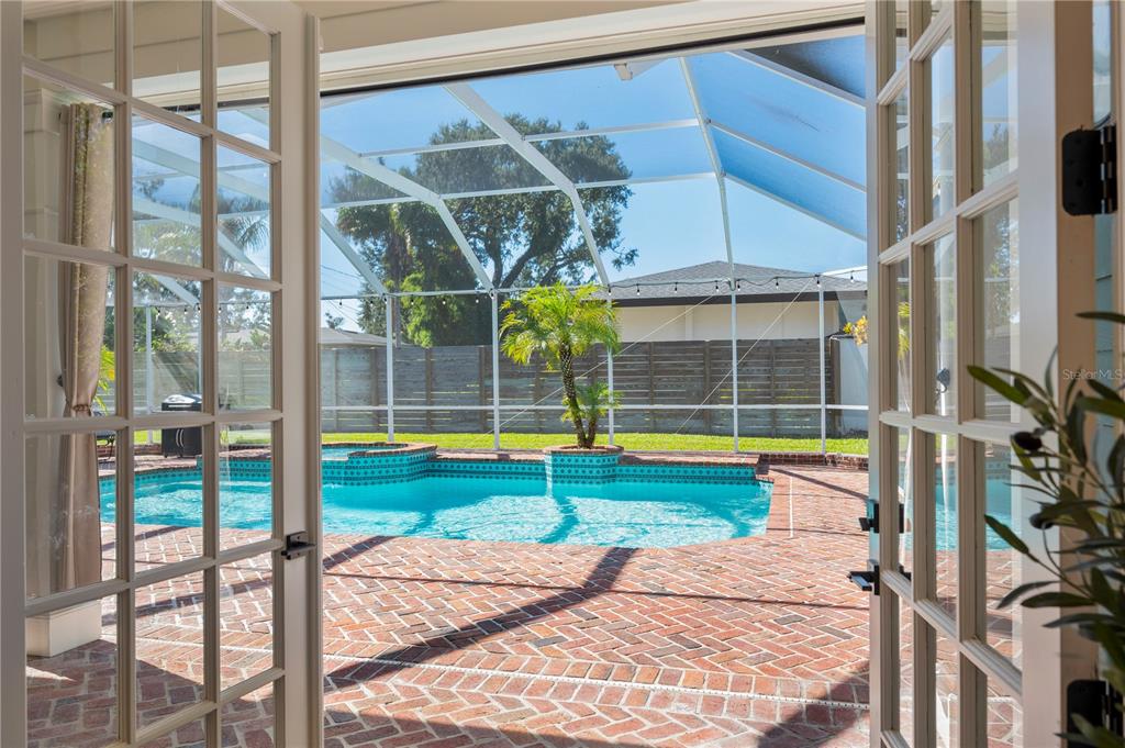 1909 New Jersey Road Lakeland, FL 33803 - Photo 42 of 93 a view of swimming pool with an outdoor space and seating area